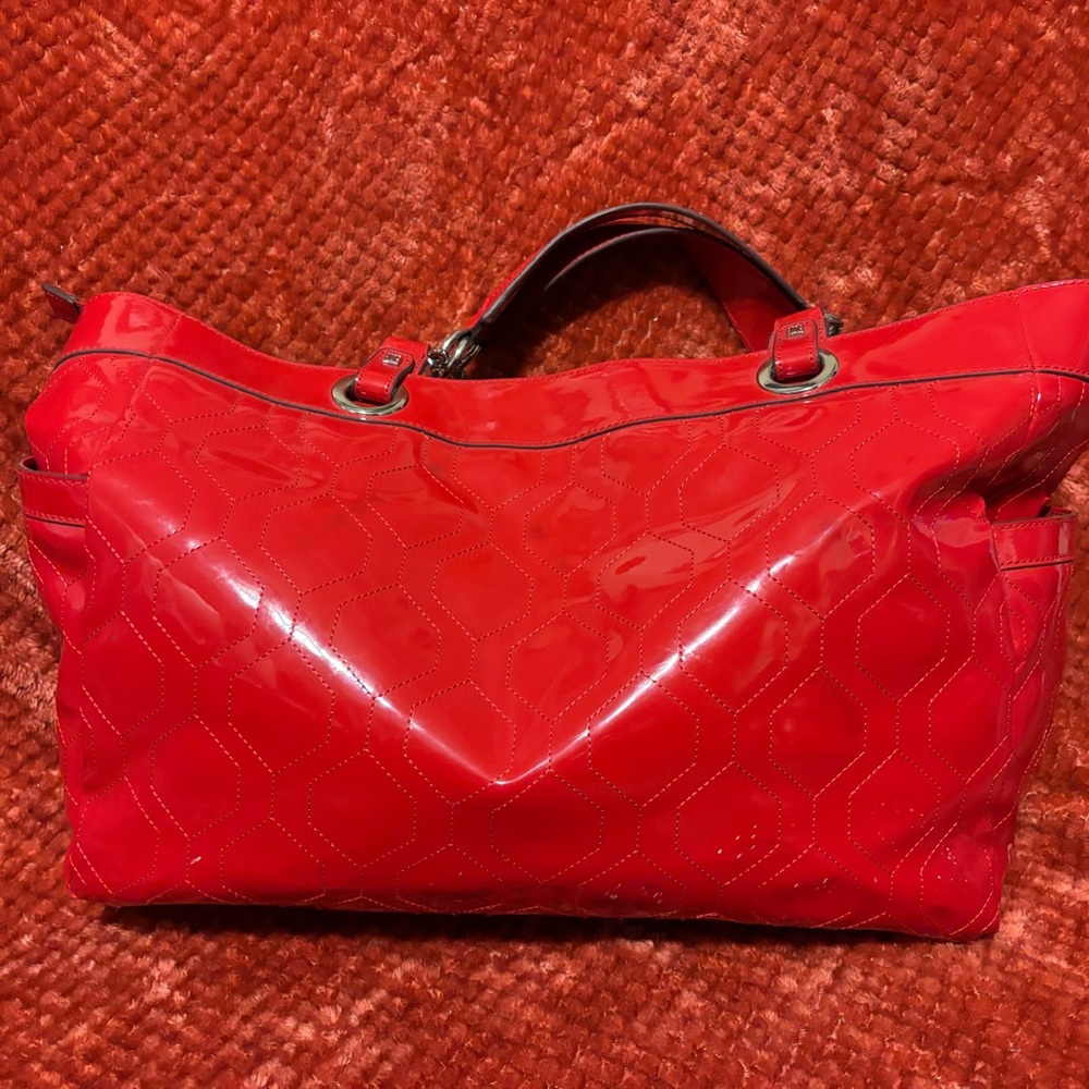 LIZ CLAIBORNEE RED BEAUTIFUL PURSE. NEVER USED BUT I DONT HAVE TAGS.